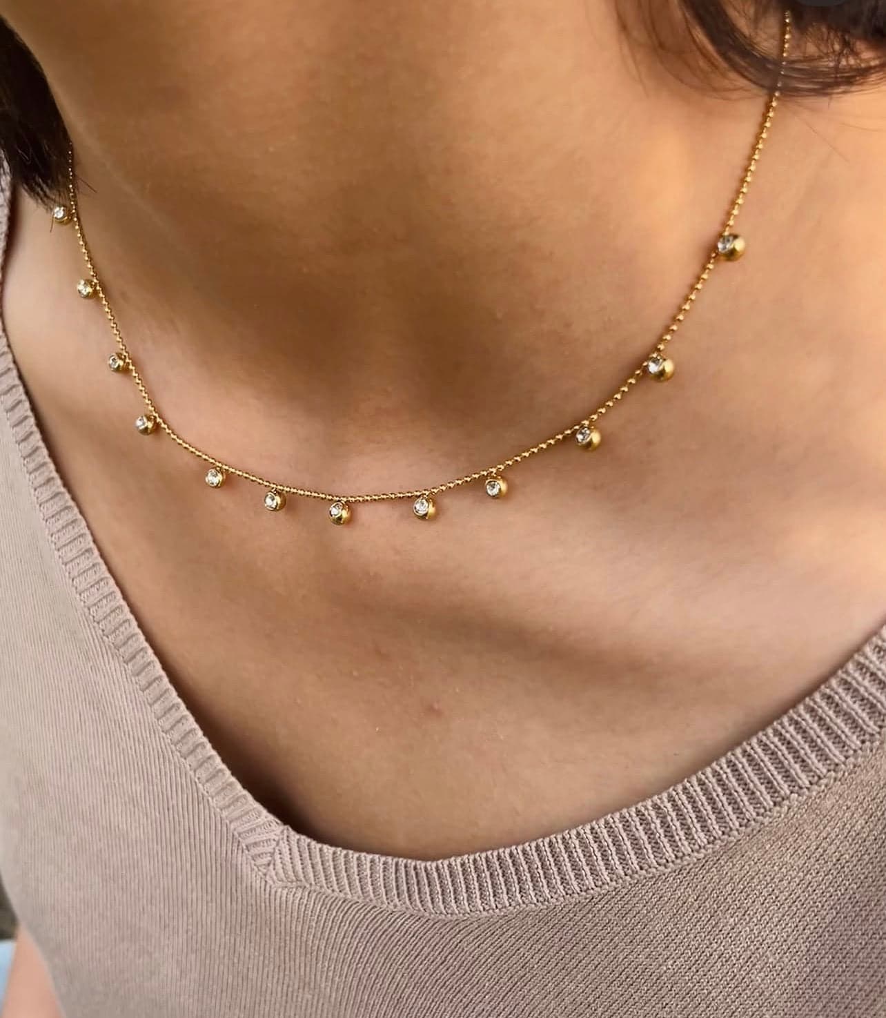 Gold necklace with crystal drops